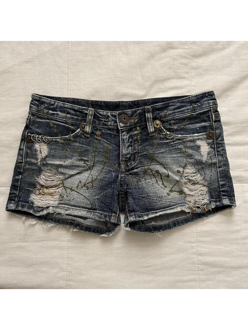 D.i.a. Distressed denim mini shorts frayed hem, rips, metal rings paint splatter